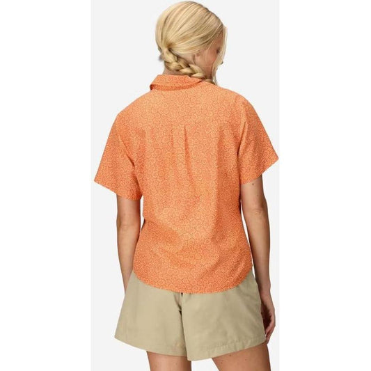 Back view of the Marmot Women's AirExchange Novelty SS Shirt in Pomelo Mini Bloom on a model wearing khaki shorts against a white background.