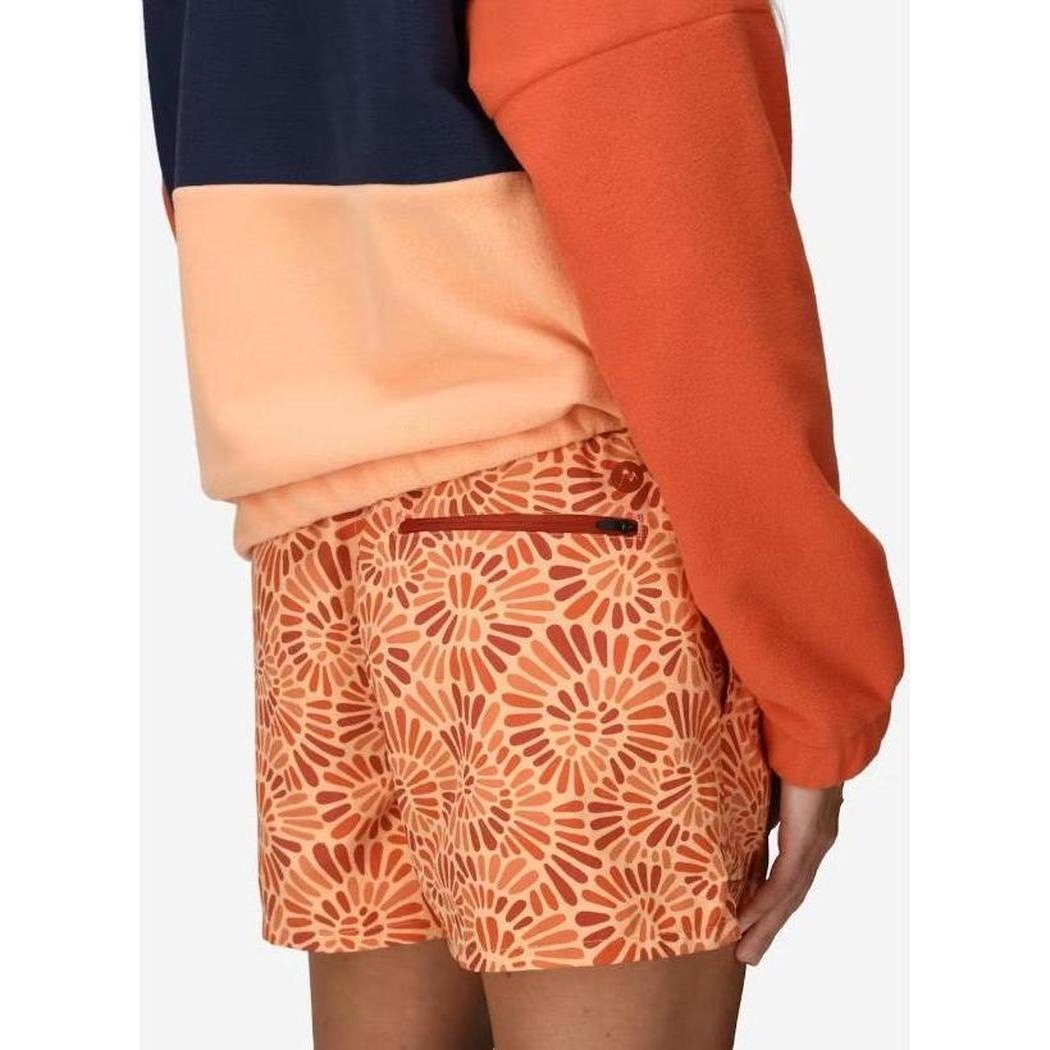 Side view of the Marmot Women's Juniper Springs Short 3" in Fresh Apricot Sunburst showing the floral pattern and back pocket against a white background.