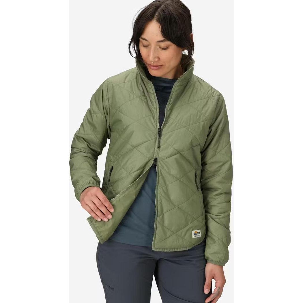 A woman wearing the Marmot Women's Onward Insulated Jacket in Olive Grove stands against a plain white background.