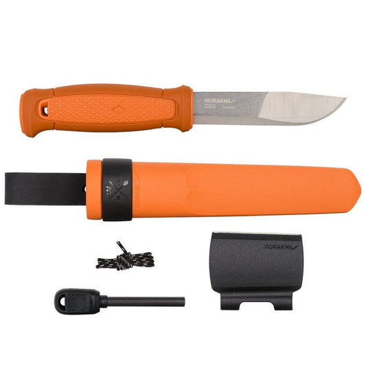 A top-down view of the Morakniv Kansbol Survival knife in Green with its sheath, fire starter, and cord visible against a white background.