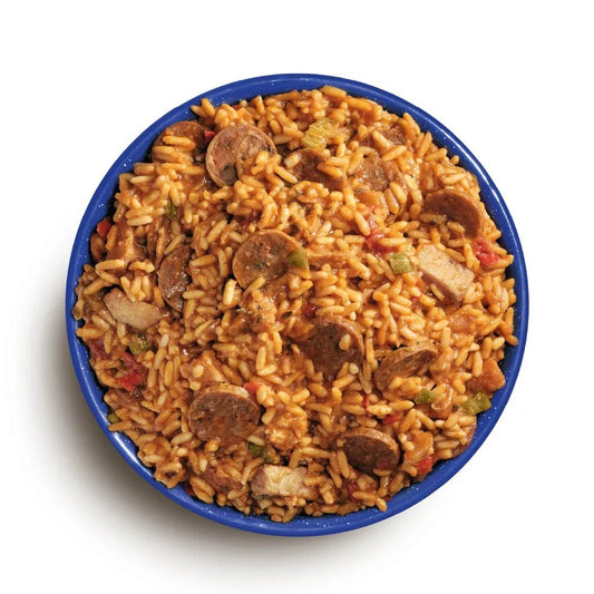 A top-down view of the Mountain House Cajun Style Jambalaya in a blue bowl.