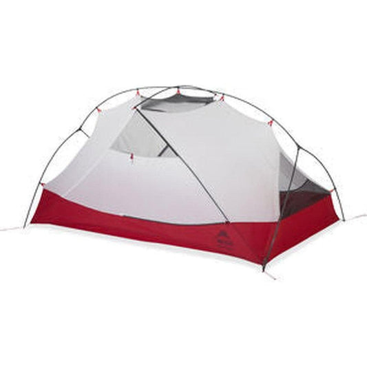 The MSR Hubba Hubba 2 Tent V9 is shown from a front angle with its red and gray fabric, set against a plain white background.