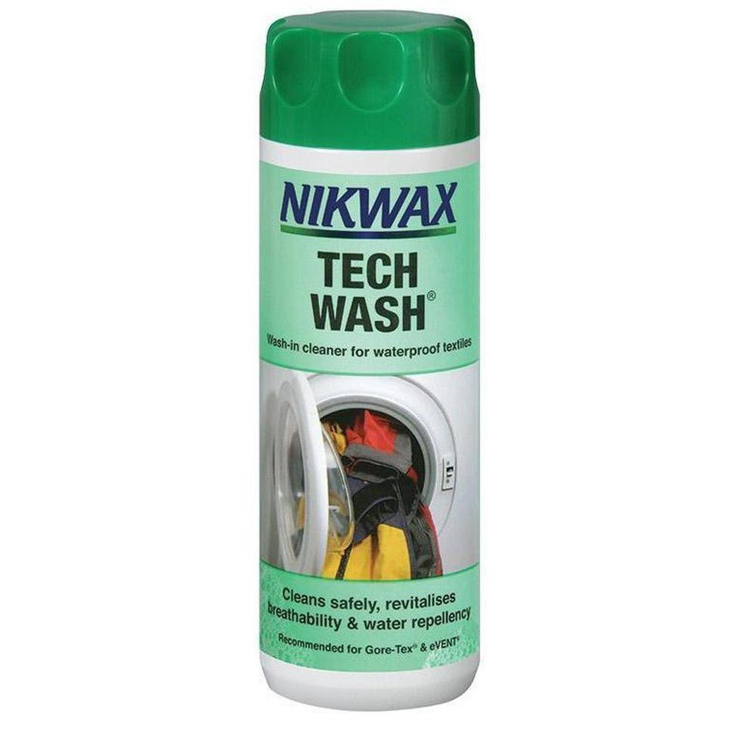 A front view of the green-capped Nikwax Tech Wash bottle showing a washing machine graphic on the label.