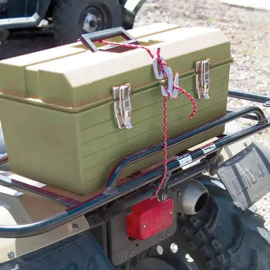 A silver Nite Ize Figure 9 Rope Tightener - Small is attached to a green tackle box on an ATV rack.