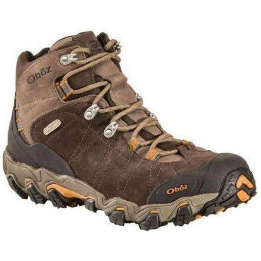 A side view of the Oboz Men's Bridger Mid B-DRY in Sudan color showing the lugged outsole against a white background.