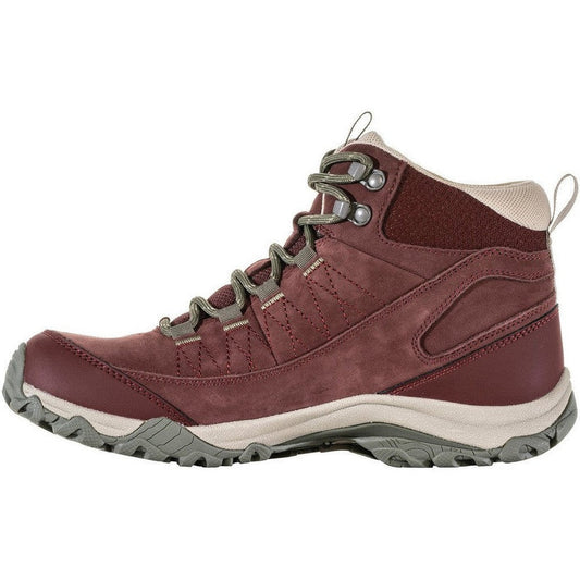 Side view of the Oboz Women's Ousel Mid B-Dry in Port showing the lugged outsole against a white background.