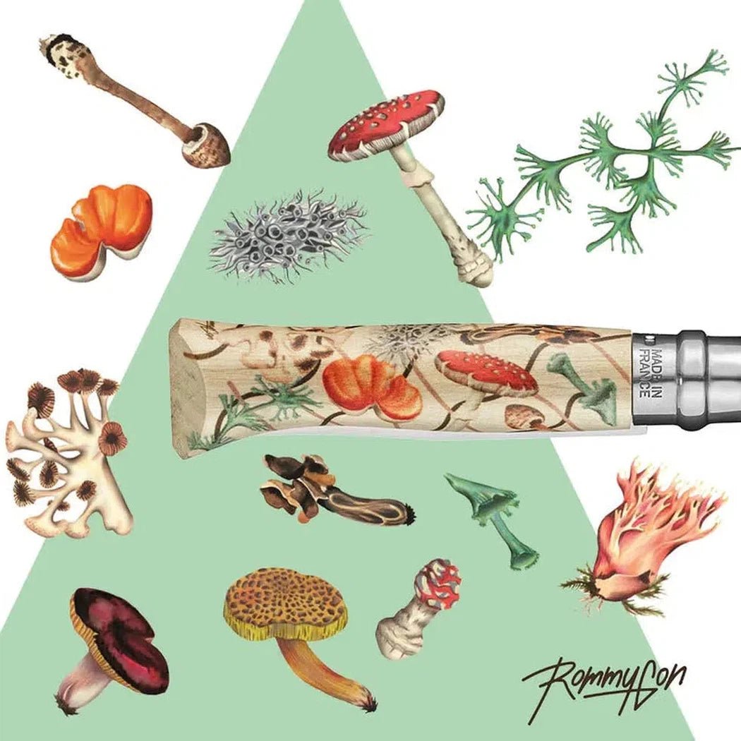 A close-up of the Opinel N.08 Artist Limited Nature Edition - Rommy Gonzalez knife with nature-themed artwork, surrounded by various mushrooms and plants on a light green background.