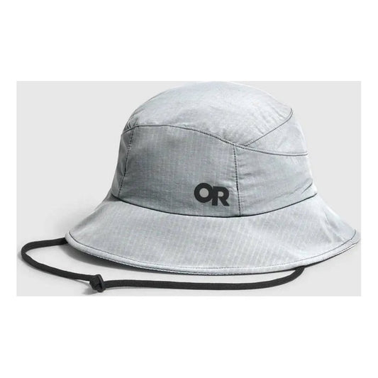 A front view of the Outdoor Research Sun Bucket Hat in Gravel color with a black chin strap against a light gray background.