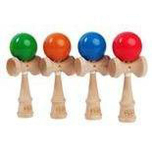 Four wooden Kendamas with green, orange, blue, and red balls stand side by side against a white background.