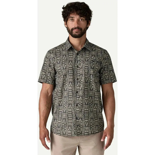 A front view of the Patagonia Men's Go To Shirt in Flow: Sunken Blue on a model wearing khaki pants against a white background.