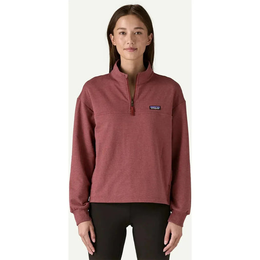 A front view of the Patagonia Women's Ahnya P/O in Basin Green on a model against a plain background.