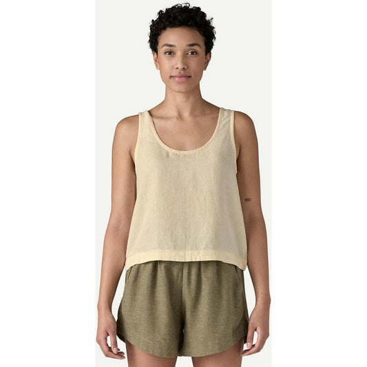 A front view of the Patagonia Women's Garden Island Top in Abstract Kaleido: Black on a model wearing olive shorts against a plain background.