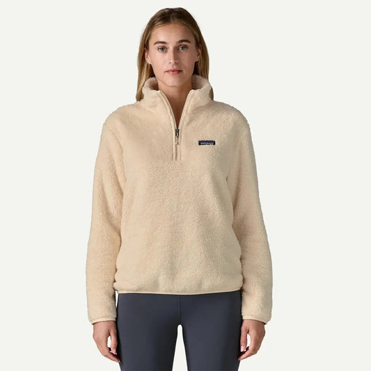A front view of the Patagonia Women's Los Gatos 1/4 Zip in Natural on a model wearing dark pants against a plain white background.