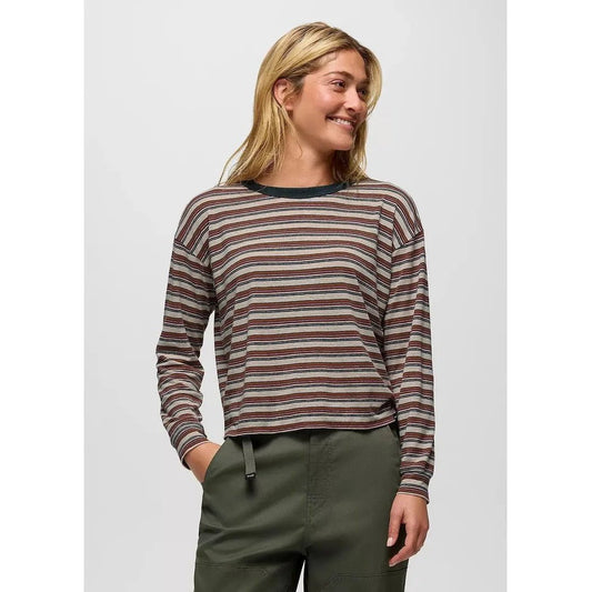 A front view of the Prana Women's Cozy Up Long Sleeve Crew in Capulet Blue Stripe with a model wearing it against a plain background.
