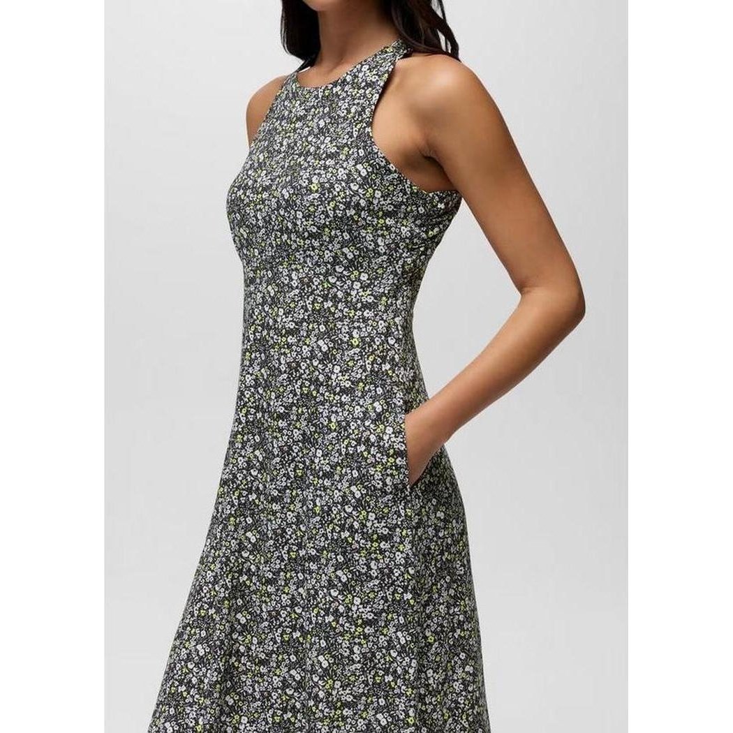 Side view of the Prana Women's Jewel Lake Summer Dress in Black Blossom showing the sleeveless design and floral pattern against a plain background.