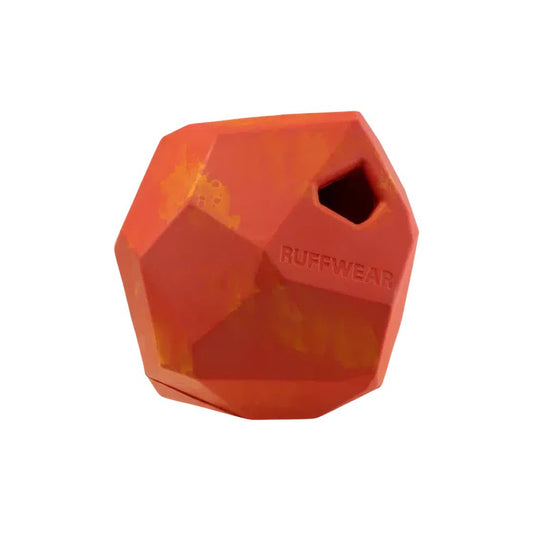 A front view of the Ruffwear Gnawt-a-rock in Dandelion Yellow showing the textured surface and a small hole on the top.