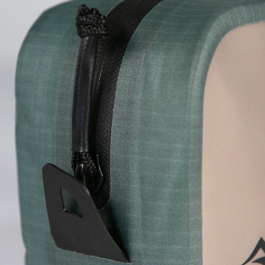 A close-up of the Sea To Summit Hydraulic Packing Cube in Jet Black showing the zipper pull and a black pull tab against a light background.