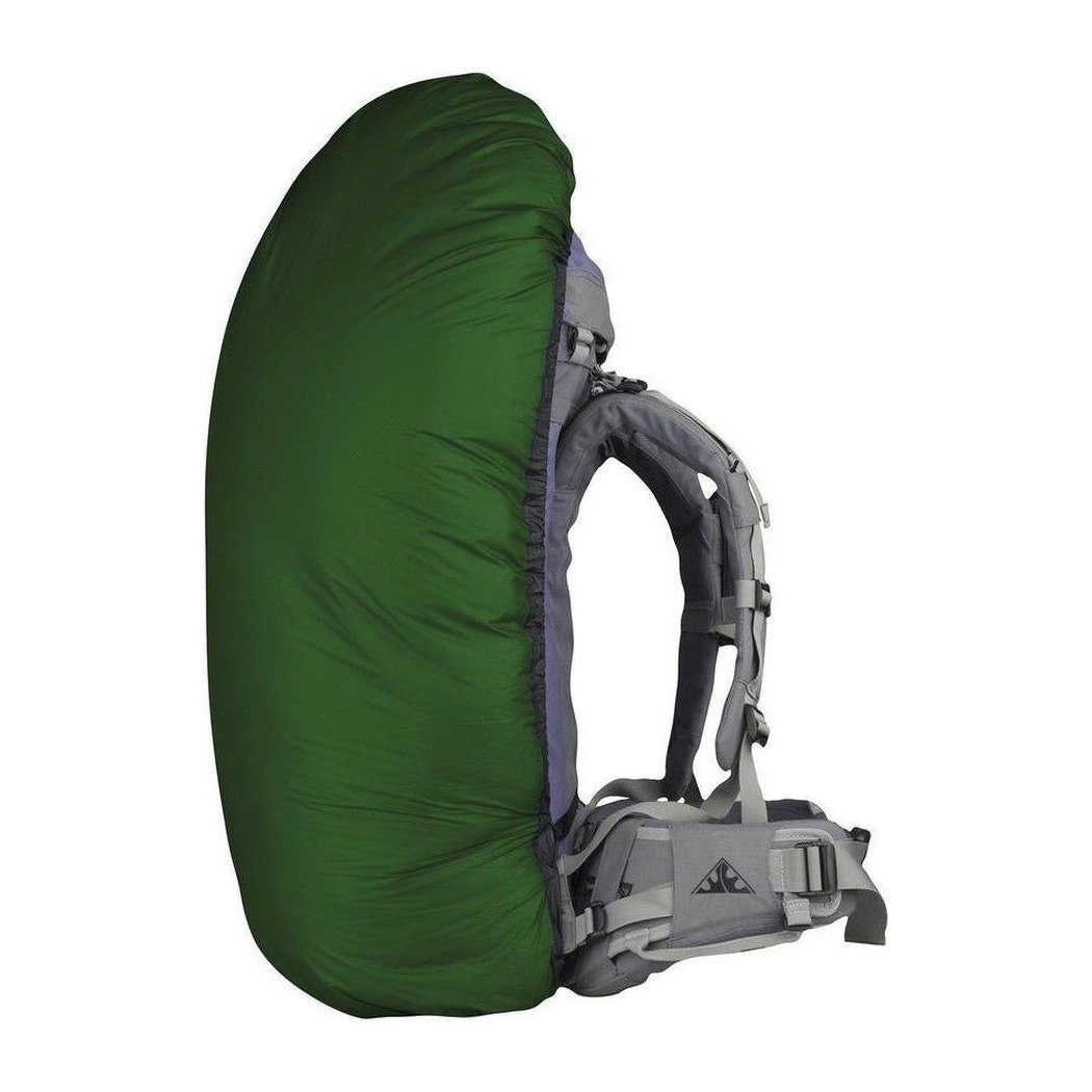 Side view of the Sea To Summit Ultra-Sil Pack Cover in Blue showing the backpack straps and a white background.
