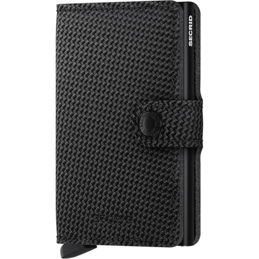A front view of the SECRID Mini Wallet - Carbon in Black showing the textured surface and secure snap closure.