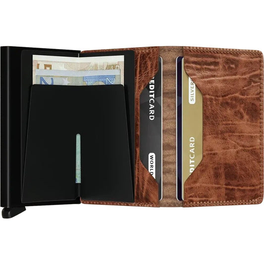 A side view of the SECRID Slim Wallet - Dutch Martin in Whiskey showing the card slots and cash pocket against a white background.