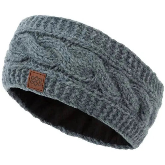 Side view of the Sherpa Adventure Gear Kunchen Headband in Blush showing the cable knit pattern and leather tag against a white background.