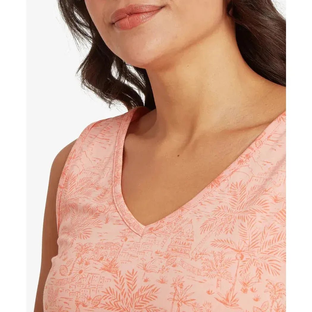 A close-up of the Sherpa Adventure Gear Women's Neha V-Neck Tank in Rose Gold, showing the V-neck and floral pattern on a model against a white background.