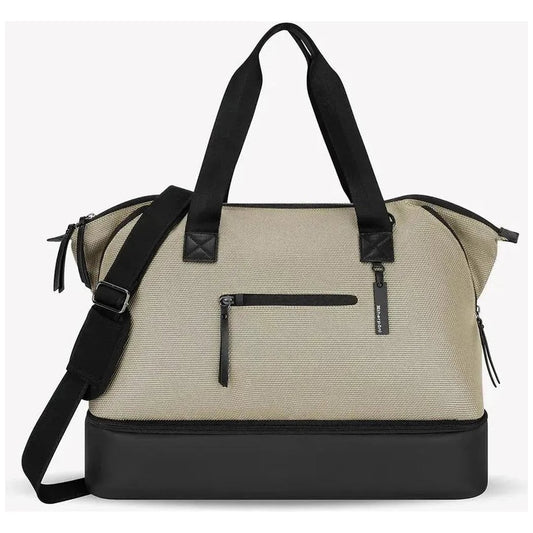 A front view of the Sherpani Eclipse AT bag in Aloe Mist showing the front zip pocket and black base against a white background.