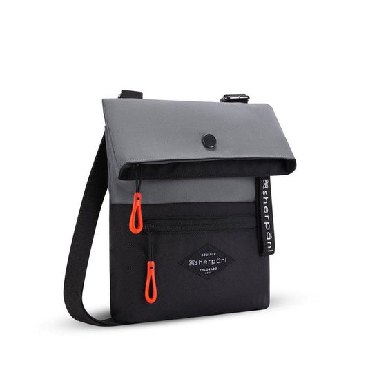 A front view of the Sherpani Pica Raven bag showing the black shoulder strap and orange zipper pulls against a white background.