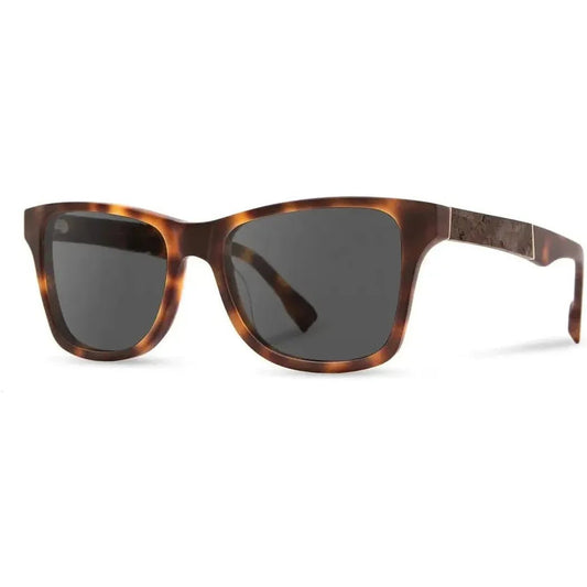Side view of the Shwood Canby XL sunglasses with tortoiseshell frames and dark lenses against a white background.
