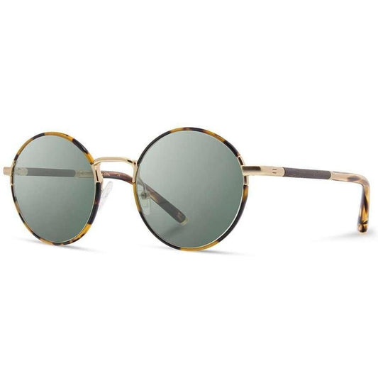 Side view of the Shwood Hawthorne sunglasses with round frames and a tortoiseshell pattern against a white background.