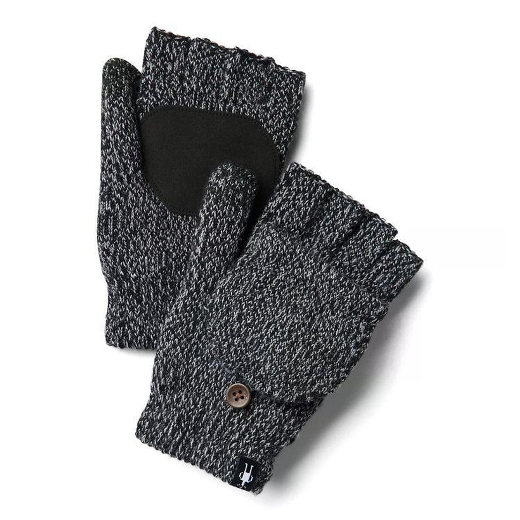 A pair of Smartwool Cozy Grip Flip Mitts in Black are shown from a top-down angle with a white background.