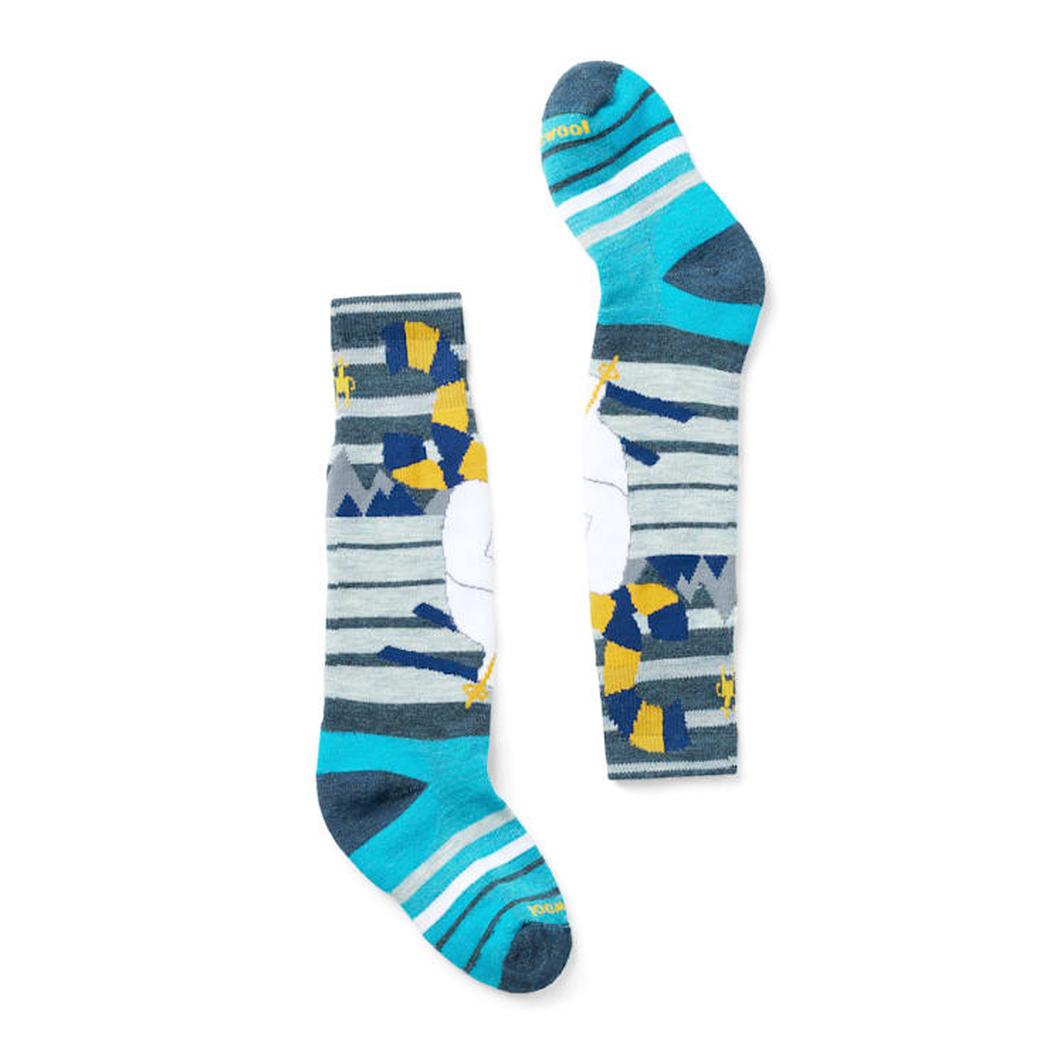 Side view of the Smartwool Kid's Wintersport Full Cushion Yeti Pattern OTC Socks in Alpine Blue against a white background.