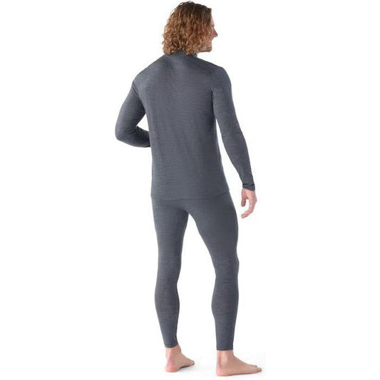 Back view of the Smartwool Men's Classic All-Season Merino Base Layer 1/4 Zip in Iron Heather on a barefoot model against a white background.