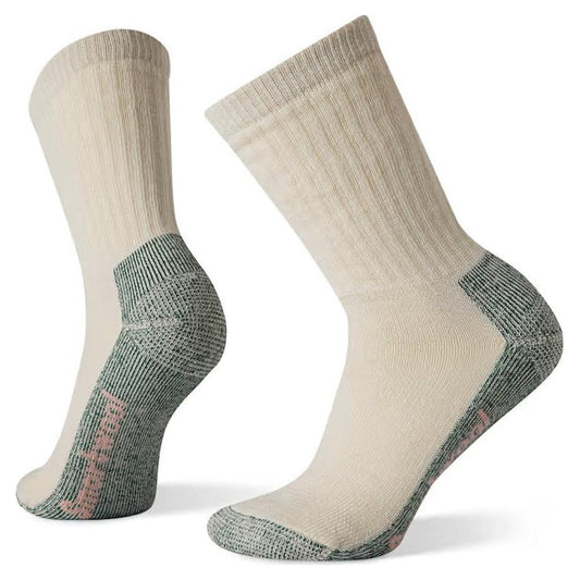 Two beige Smartwool Women's Classic Hike Full Cushion Crew socks with charcoal heel and toe, shown from a side angle against a white background.