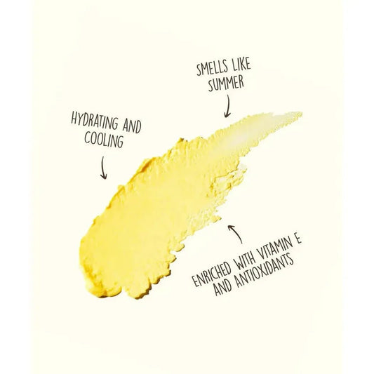 A swatch of yellow Sun Bum OG SPF 50 Face + Body Stick with text describing its hydrating, cooling, and vitamin E-enriched features.