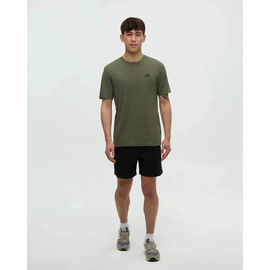 A model wearing the Tentree Men's Have You Seen Him Floatie T-Shirt in Deep Olive Heather Midnight Blue stands against a plain white background.