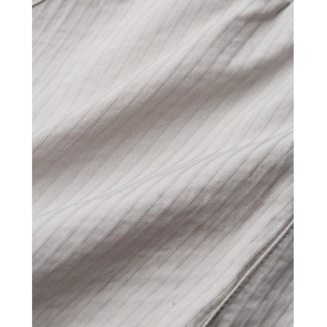 A close-up of the Tentree Men's Hopkins Shirt in Sand Stone Graphite showing the fabric texture and subtle stripes.
