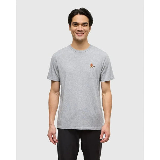 A model wearing the Tentree Men's Sasquatch T-Shirt in Deep Burgundy Heather Lumberjack stands against a plain white background.
