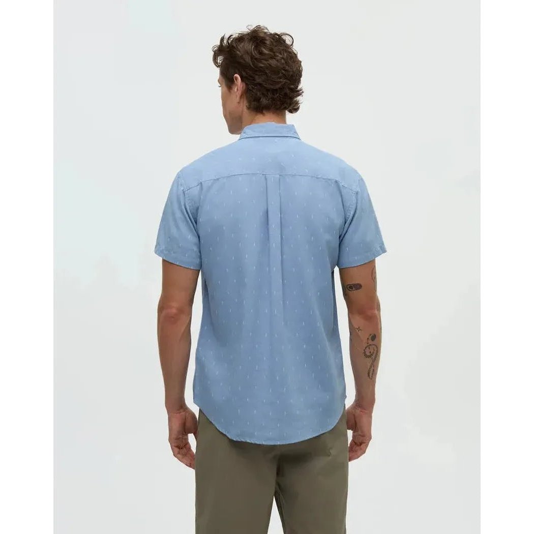 Back view of the Tentree Men's Small Tree Mancos Shirt in Lake Blue Small Tree on a model against a plain white background.