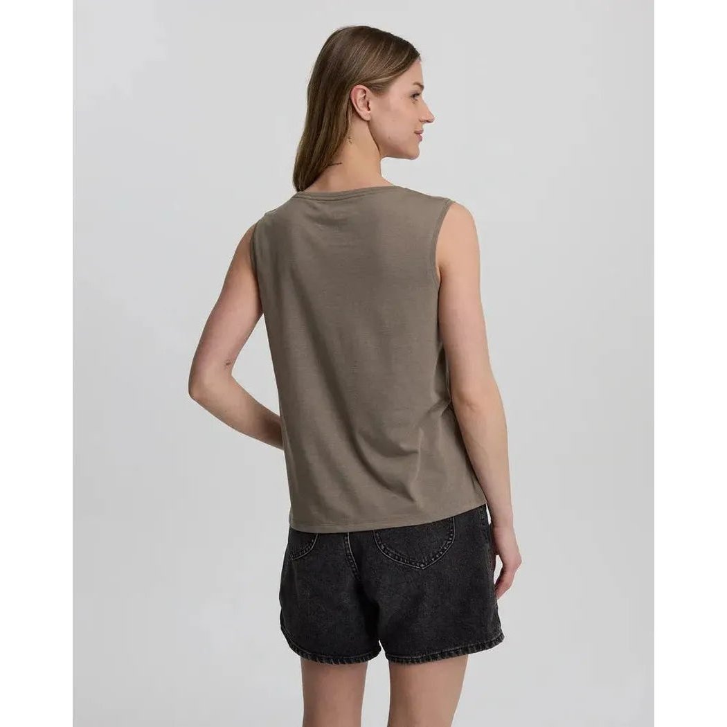 Back view of the Tentree Women's Lakeside Florals Tank in Clay/Timber on a model wearing dark denim shorts against a plain background.