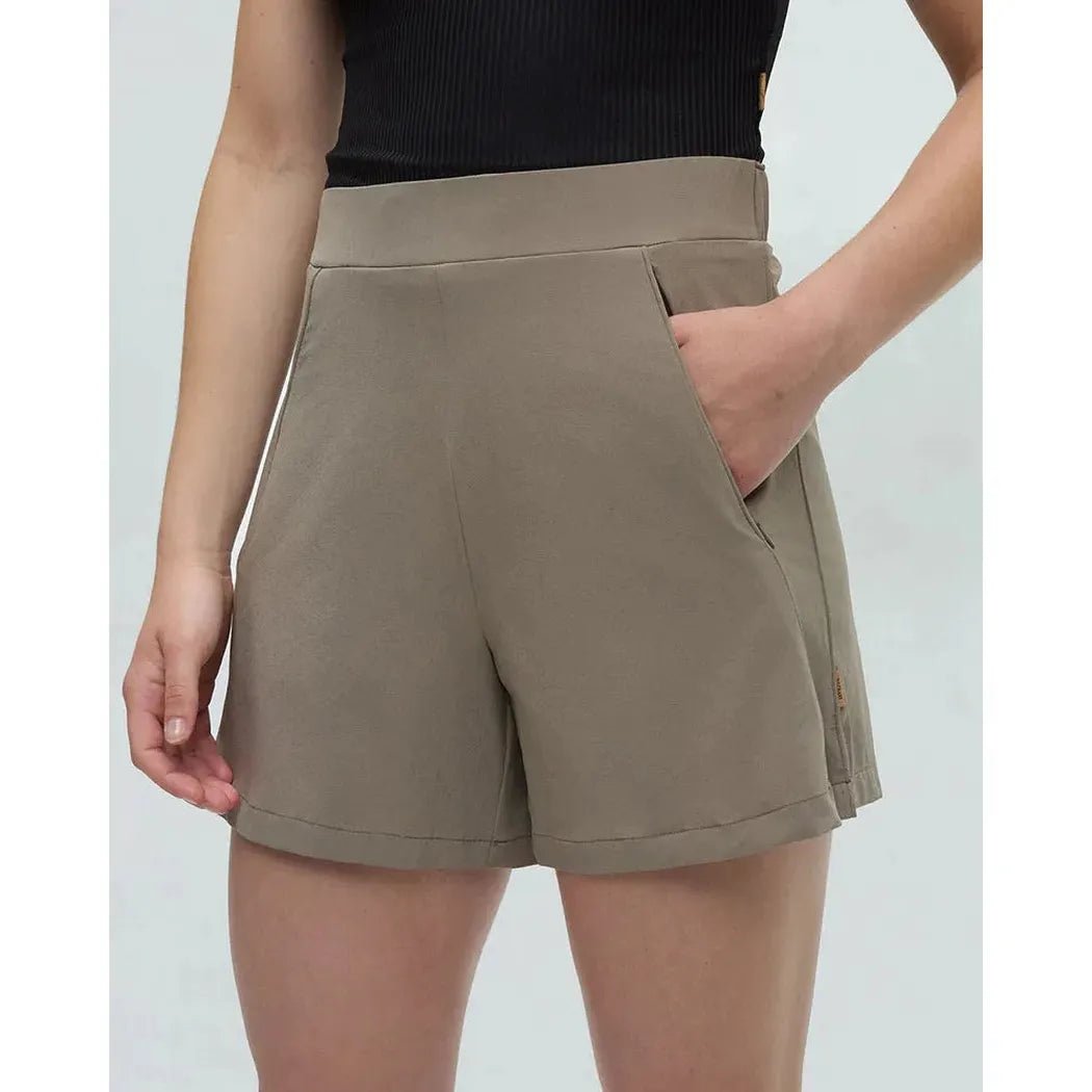 Side view of the Tentree Women's Solstice Short in Clay showing the front pocket and model wearing it against a light background.
