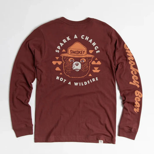 Back view of the Angostura The Landmark Project Spark A Change Unisex Long Sleeve Tee w/ Pocket showing the Smokey Bear graphic and text on a white background.