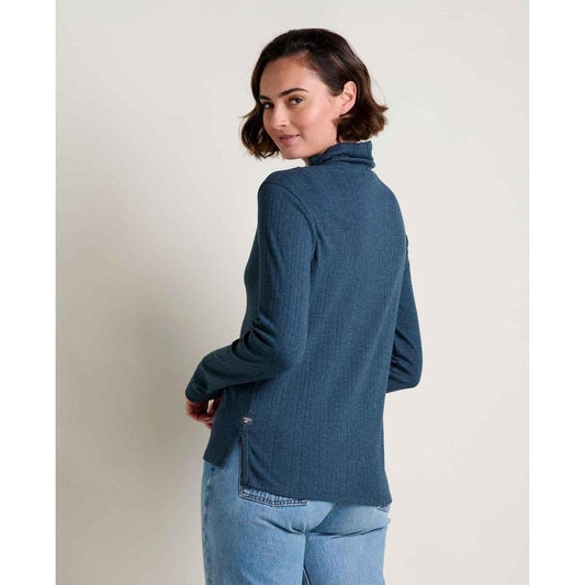 Back view of the Toad & Co Women's Foothill Pointelle Long Sleeve T-Neck in Midnight on a model wearing light blue jeans against a plain background.