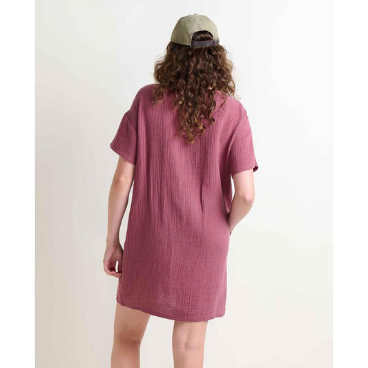 Back view of the Toad & Co Women's Tate Double Weave Short Sleeve Dress in Wild Ginger on a model wearing a cap against a plain white background.