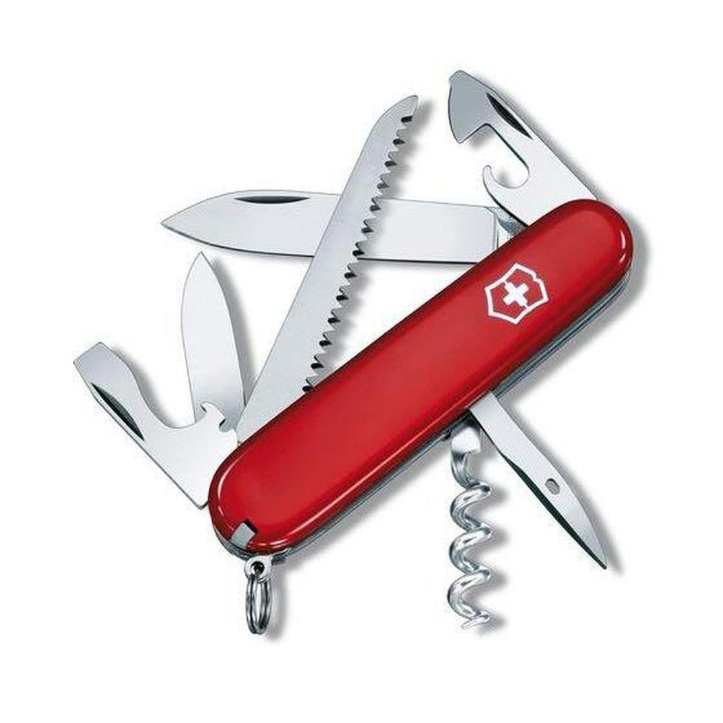 A red Victorinox Camper multi-tool with a corkscrew and various blades visible, photographed against a white background.