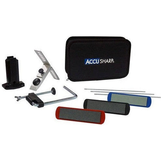 A black AccuSharp Three Stone Precision Kit with red, charcoal, and blue stones lies on a white background.