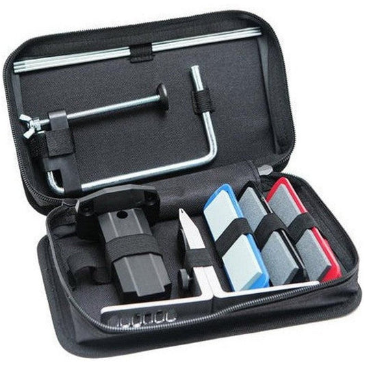Open black case of the AccuSharp Three Stone Precision Kit showing the three stones and sharpener inside.