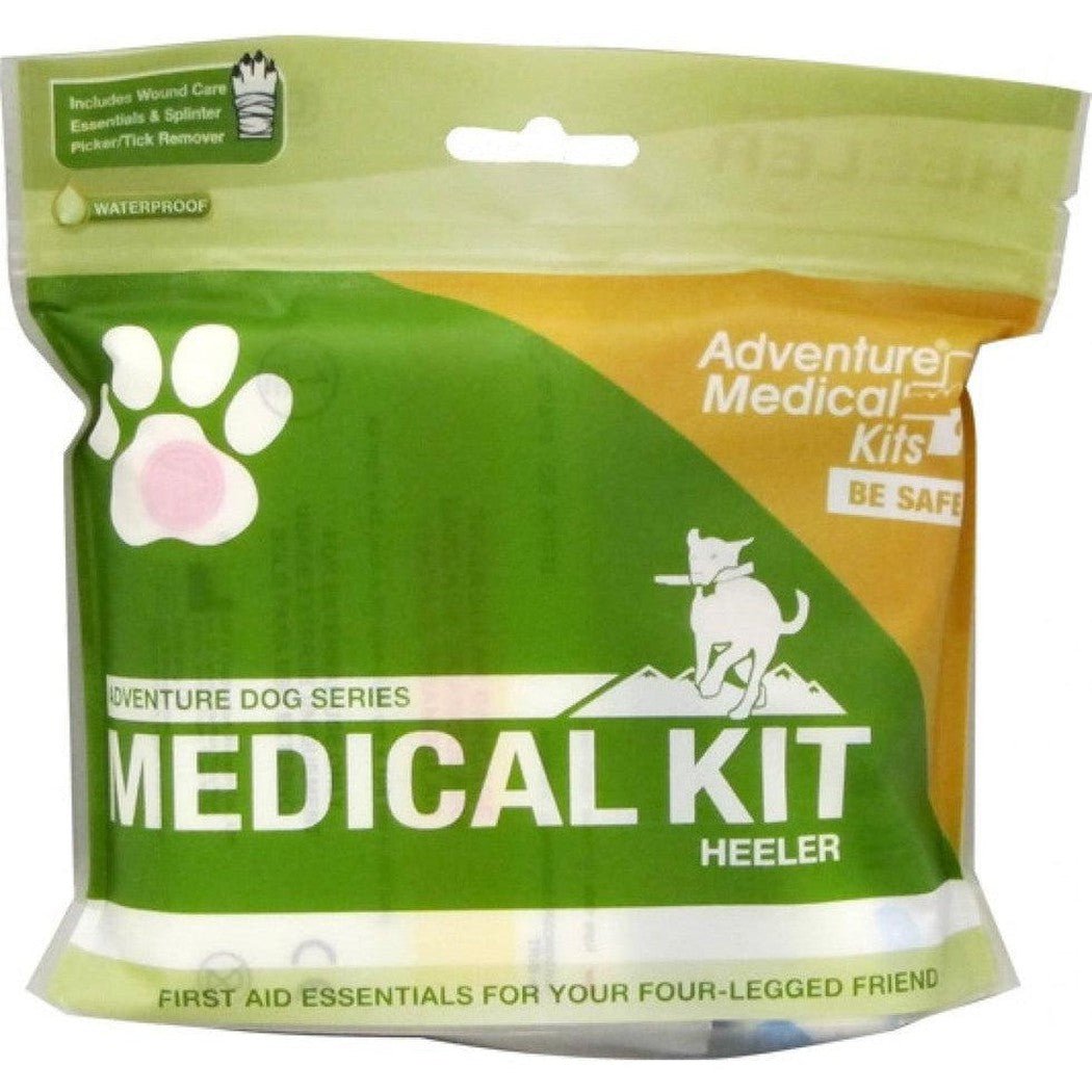 A green and orange Adventure Medical Kits Adventure Dog Series Heeler first aid kit bag with a paw print logo and dog graphic.