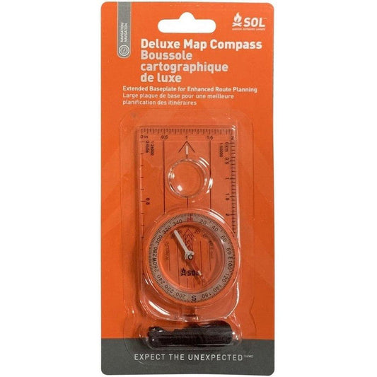 The orange packaged Adventure Medical Kits Deluxe Map Compass shows its extended baseplate and compass face in the front view.