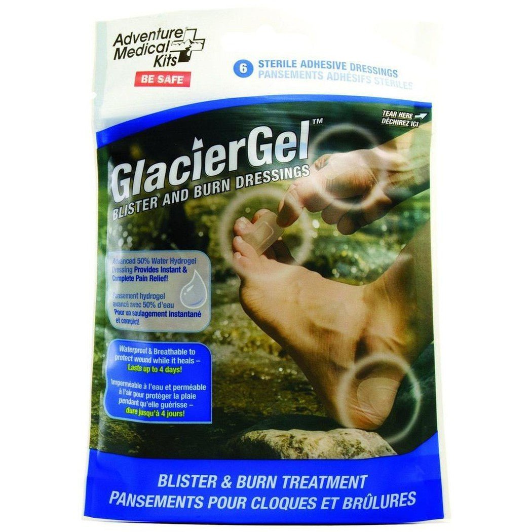 A package of Adventure Medical Kits GlacierGel Blister and Burn Dressings showing a foot with a blister on a rocky background.